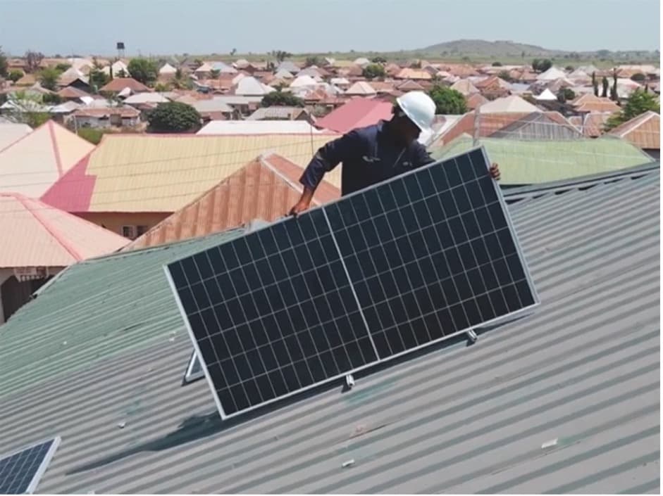 A solar system is being installed on a roof